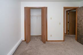 Bloomingdale apartment for rent - a bedroom with a closet and a door to a bathroom