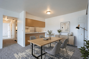 Sturgis apartment for rent - A dining room with a wooden table and grey chairs.