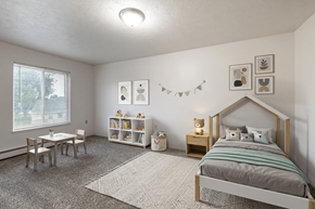 Hillsdale apartment for rent - A bedroom with a bed, a table and chairs, and a window.