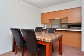 Lawton apartment for rent - Well Equipped Kitchen And Dining at Ross Estates Apartments, MRD Conventional, Oklahoma