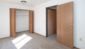 Gagetown apartment for rent - an empty room with two doors and a closet