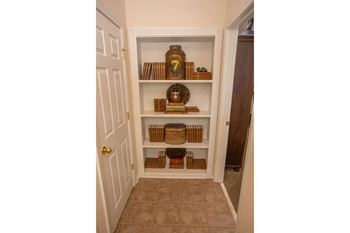 Floor-to-ceiling bookcases in select homes