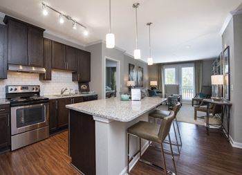 Wood style plank flooring in kitchen at riverwood