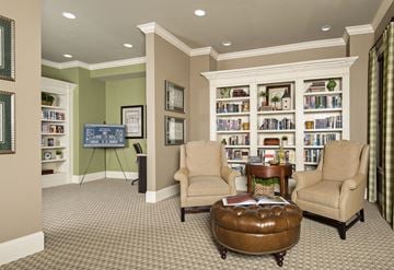 Acworth apartment for rent - a living room filled with furniture and a book shelf