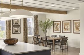 Norcross apartment for rent - A dining room with a table set for four.