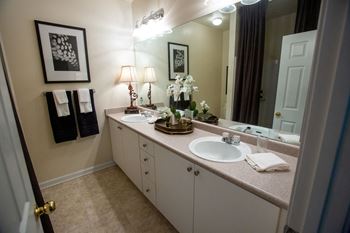 Luxurious baths with double sinks in select homes