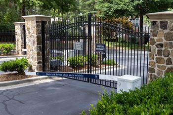 Controlled access entry gates and community perimeter fencing