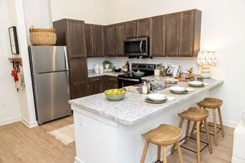 Bright, open floor plans with expansive windows offer an abundance of light