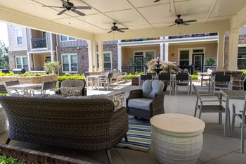 Beautifully landscaped courtyard with sitting areas (click for video))