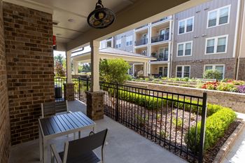 Beautifully landscaped courtyard with sitting areas (click for video))