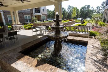 Beautifully landscaped courtyard with sitting areas (click for video))