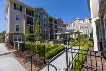 Beautifully landscaped courtyard with sitting areas (click for video))