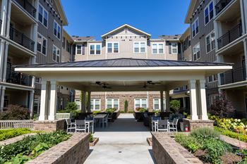 Beautifully landscaped courtyard with sitting areas (click for video))