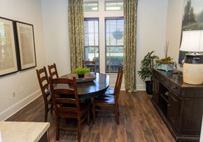 Augusta apartment for rent - a dining room with a table and chairs