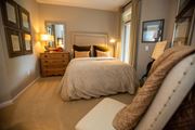 Atlanta apartment for rent - a bedroom with a bed and a dresser and a window