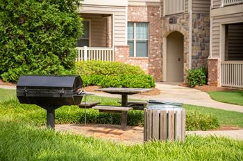 Picnic areas with tables and grills