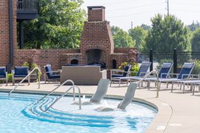 Atlanta apartment for rent - Walton Westside a pool with a brick fireplace in the background