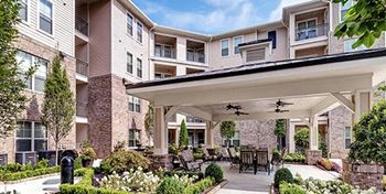 Beautifully landscaped courtyard with sitting areas (click for video))