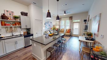 Bright, open floor plans with expansive windows offer an abundance of light