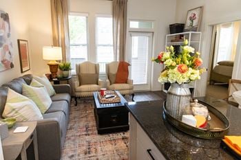 Bright, open floor plans with expansive windows offer an abundance of light