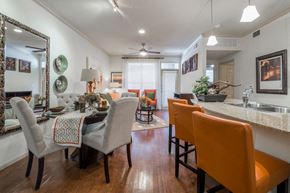 Odessa apartment for rent - A dining room with a table set for four.