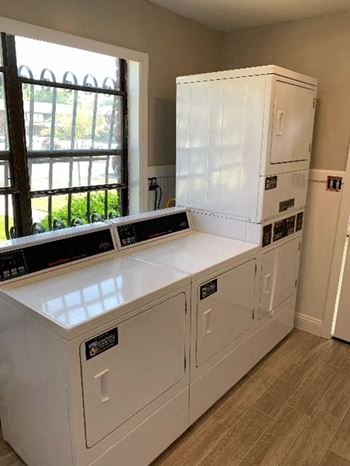 A laundry room with a washer and dryer