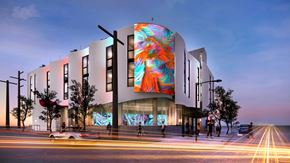 Los Angeles apartment for rent - a rendering of a building with a colorful facade on a city street
