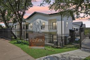 Austin condo for rent - A sign that says Rhone stands in front of a building.