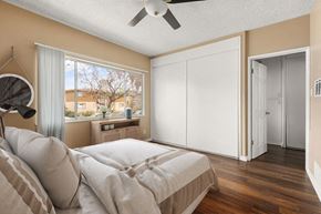 Los Angeles apartment for rent - a bedroom with a bed and a ceiling fan