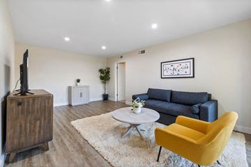 Woodland Hills apartment for rent - a living room with a couch and a table