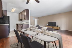 Newbury Park apartment for rent - an open living room and dining room with a table and chairs