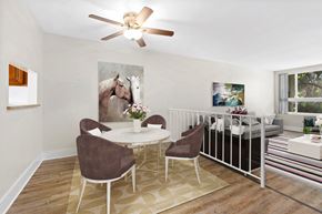 Culver City apartment for rent - a living room filled with furniture and a ceiling fan at Parkway Plaza Apartments, California, 90230