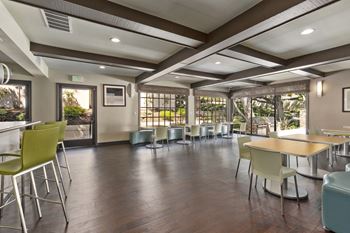 Club house with lounge areas, full kitchen, eating areas & game room