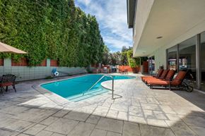 Encino apartment for rent - Pool and Seating chairs at White Oak Terrace Apartments, Encino, 91316
