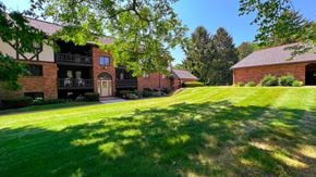 Canton apartment for rent - Green lawn and trees at Carriage Hill Apartments: A 55 and Better Community, Canton, OH, Ohio, 44718