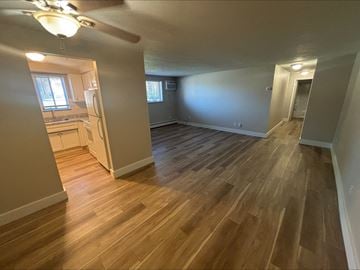 Middleburg Heights apartment for rent - A room with wooden floors and a ceiling fan.