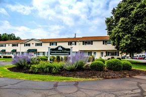 Elyria apartment for rent - Property Entrance Sign at Evergreen Village Apartments & Townhouses, Elyria, OH