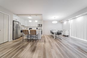University Heights apartment for rent - A kitchen with a dining table and chairs. at Huntington Green Apartments, University Heights, OH