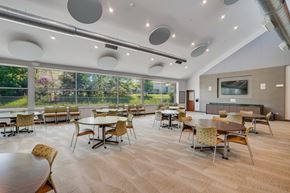 Parma Heights apartment for rent - A conference room with a long table and chairs at Independence Place Apartments, Parma Heights, OH