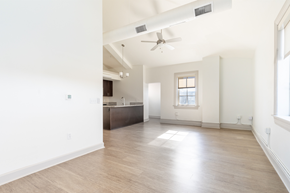 Homestead apartment for rent - A spacious room with a ceiling fan and a window.