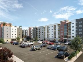 Draper apartment for rent - A parking lot with cars and apartment buildings in the background.