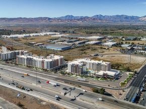 Draper apartment for rent - A highway with cars driving on it and buildings on the side.