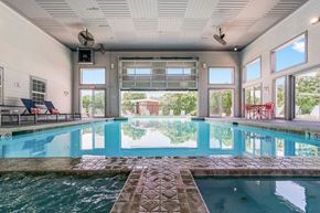 Shawnee apartment for rent - Indoor & Outdoor Pool Area With Garage Door That Goes Up