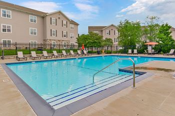 Resort-style pool with sundeck
