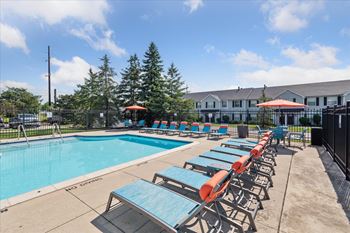 Sparkling outdoor pool with sundeck