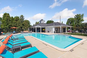Sparkling outdoor pool with sundeck