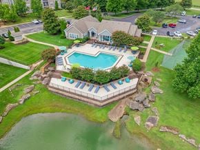 Columbia apartment for rent - Aerial view of the pool, pond, and community