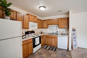 Cedar Rapids apartment for rent - Fully-Equipped Kitchen With White Appliances