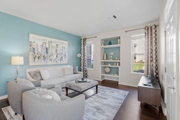 O'fallon apartment for rent - a living room with blue walls and a white couch