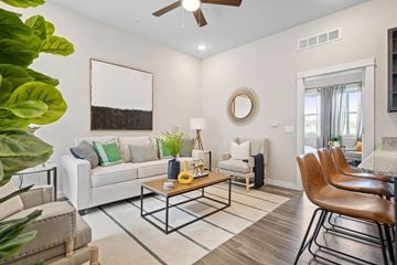Lake St. Louis apartment for rent - a living room with furniture and a ceiling fan